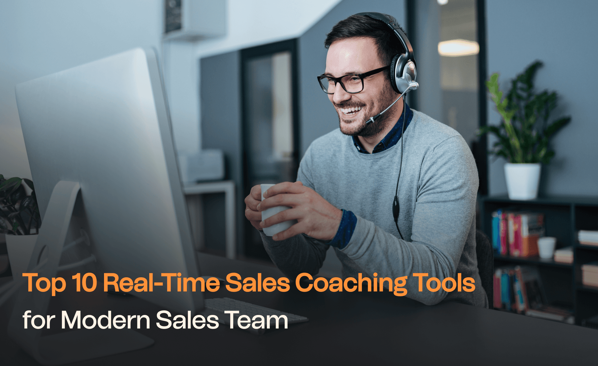 Smiling sales professional wearing a headset, holding a coffee cup, and engaging in a video call at a desk with a computer; overlaid text reads "Top 10 Real-Time Sales Coaching Tools for Modern Sales Team."
