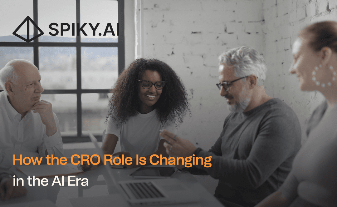 Business leaders in a meeting discussing revenue strategy, featured in Spiky.AI’s ‘How the CRO Role Is Changing in the AI Era