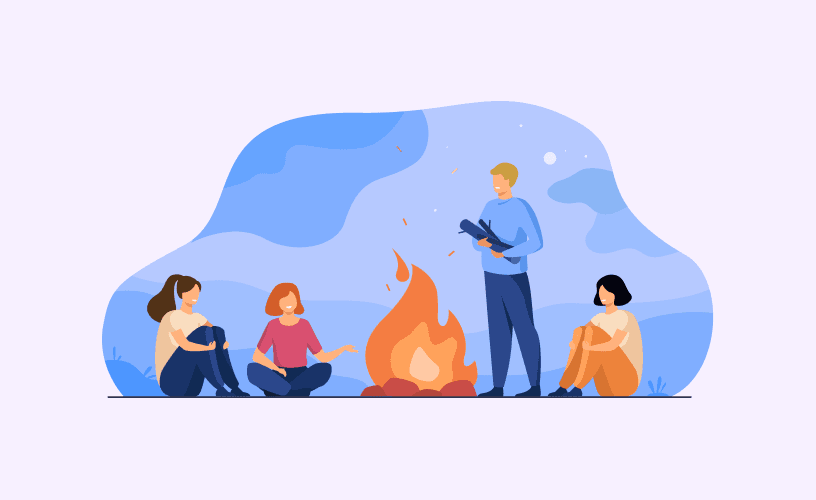 People gathered around a campfire, engrossed in a book, experiencing the power of storytelling to elevate sales and measure success.